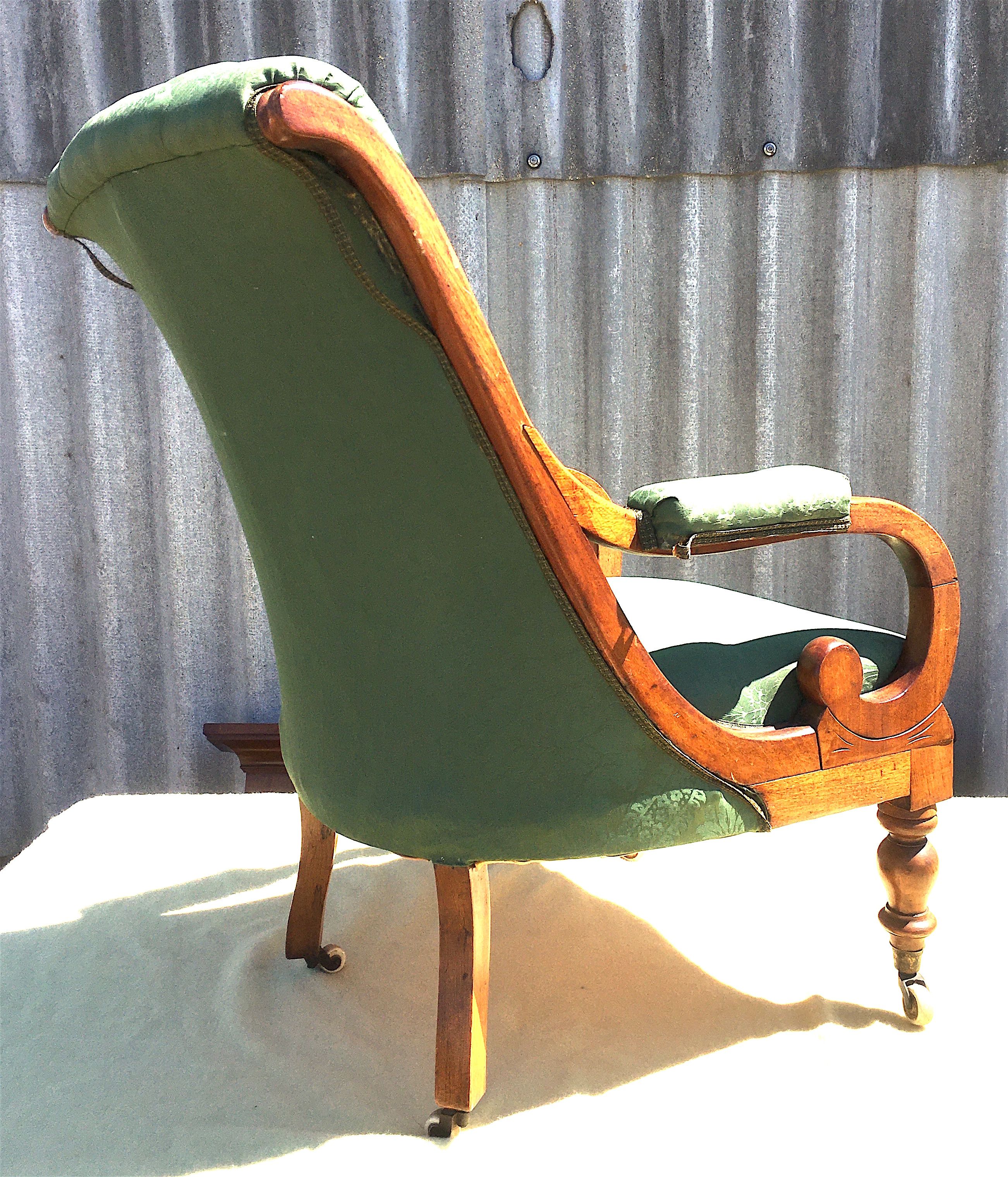 A mid Victorian upholstered mahogany armchair, width 66cm, depth 70cm, height 94cm